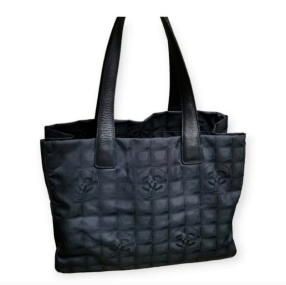 CHANEL Handbags - CHANEL NYLON Camellia vintage tote